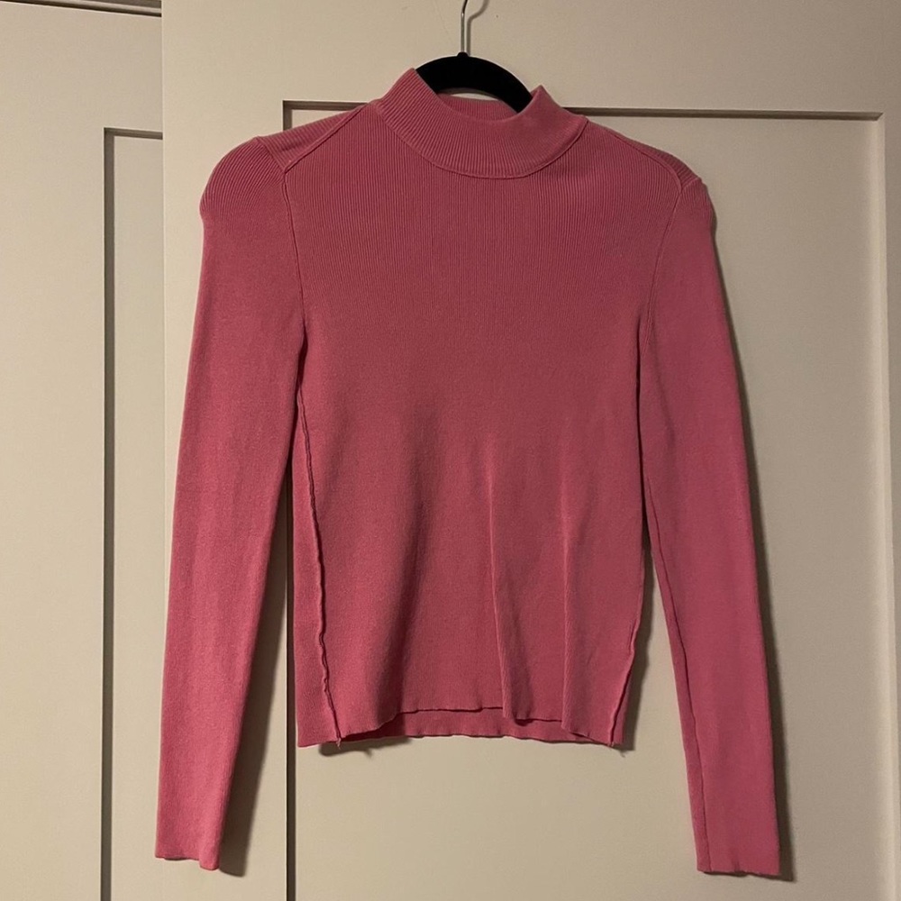 pink turtleneck